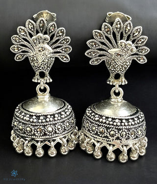 A image of Iksha Peacock Silver Marcasite Jhumkas pair with KO jewellery logo in the bottom left