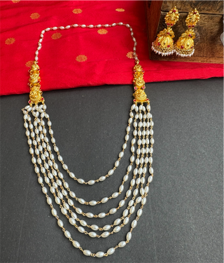 The Nivriti Silver Layered Peacock Pearl Necklace