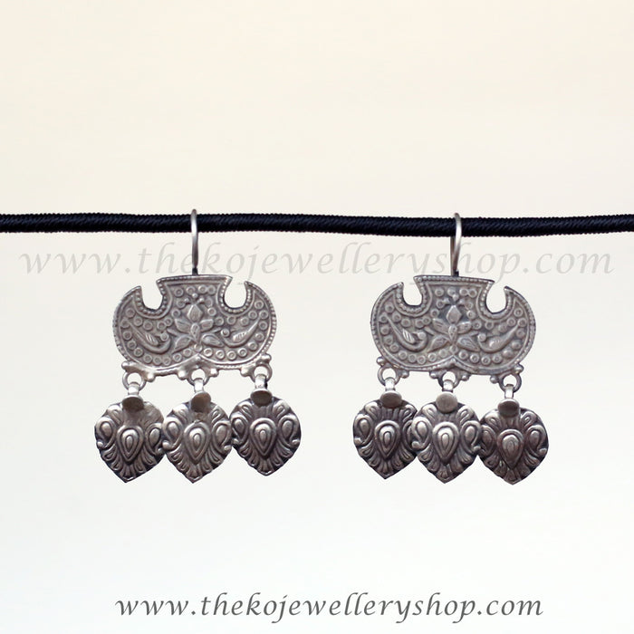 The Karthika Silver Peacock Earrings