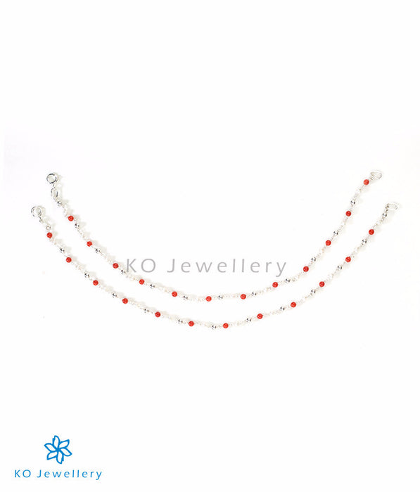 Red anklets with coral beads