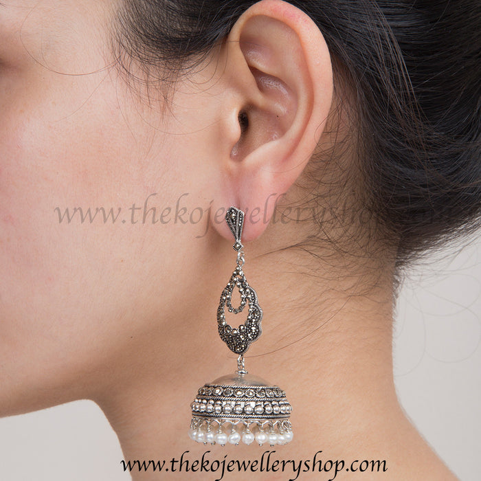 sterling silver jhumka  decorated with pearl droplets and marcasite stones 