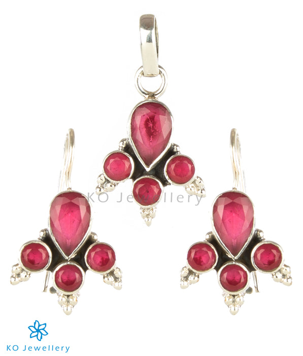 Genuine red zircon and silver pendant set