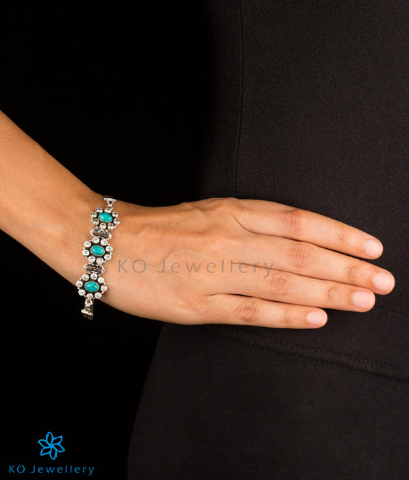 Stunning handmade charm bracelets decorated with natural turquoise