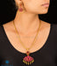 Reversible gold necklace set with red stones