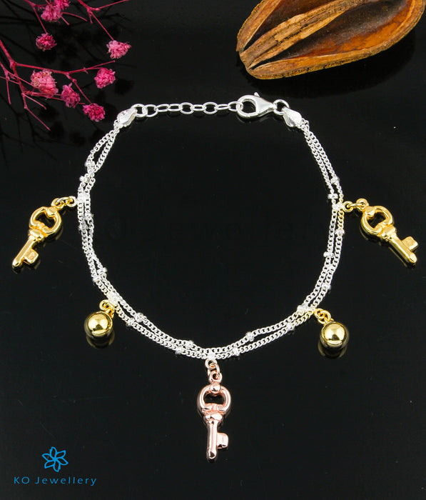 The Nazia Key Silver Charms Bracelet