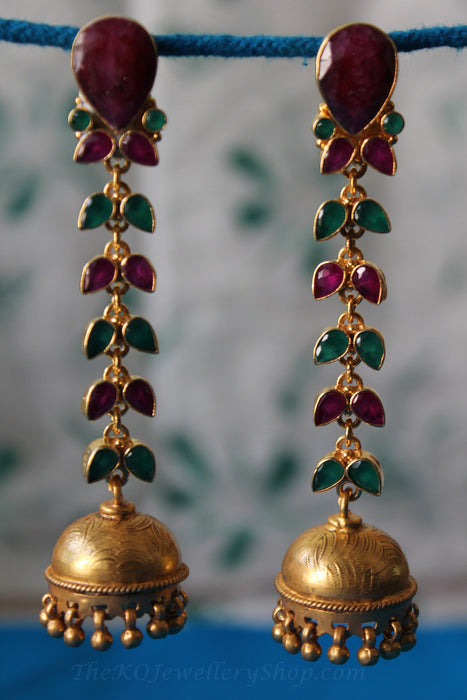 beautifully designed gold plated ruby jhumka jewelery