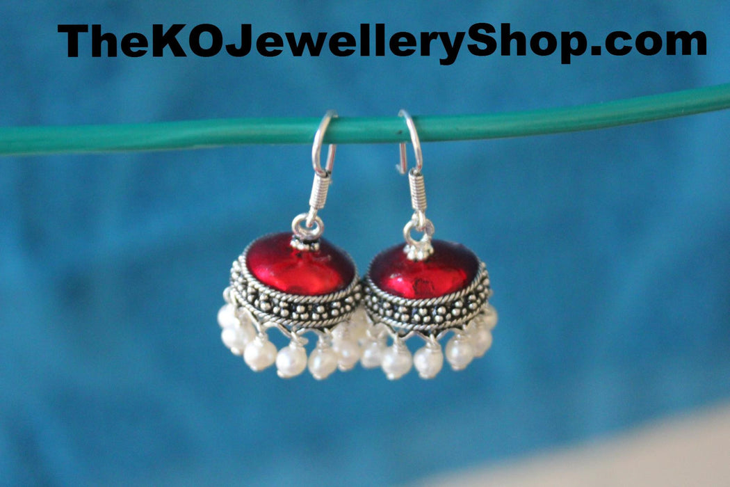 Shop online for women’s silver red  jhumka jewellery