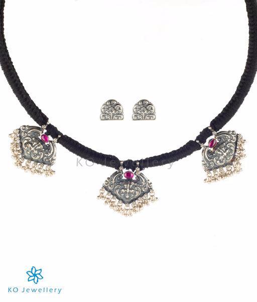 Elegant temple jewellery necklace set with traditional motifs